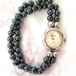 Vintage Mudd Women's Watch, dark gray beaded stretch band